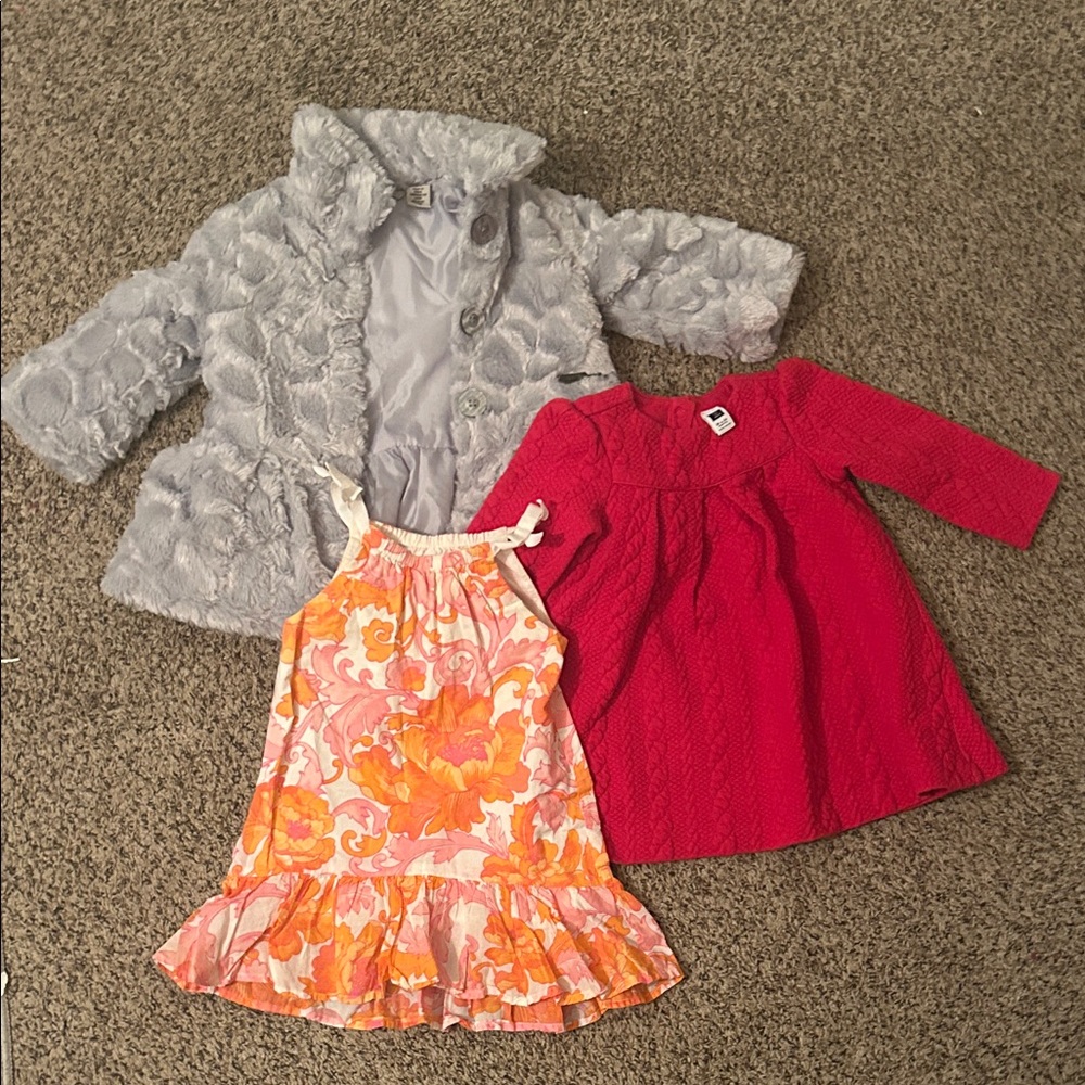 High end kids gray dress vest and two vibrant dresses.